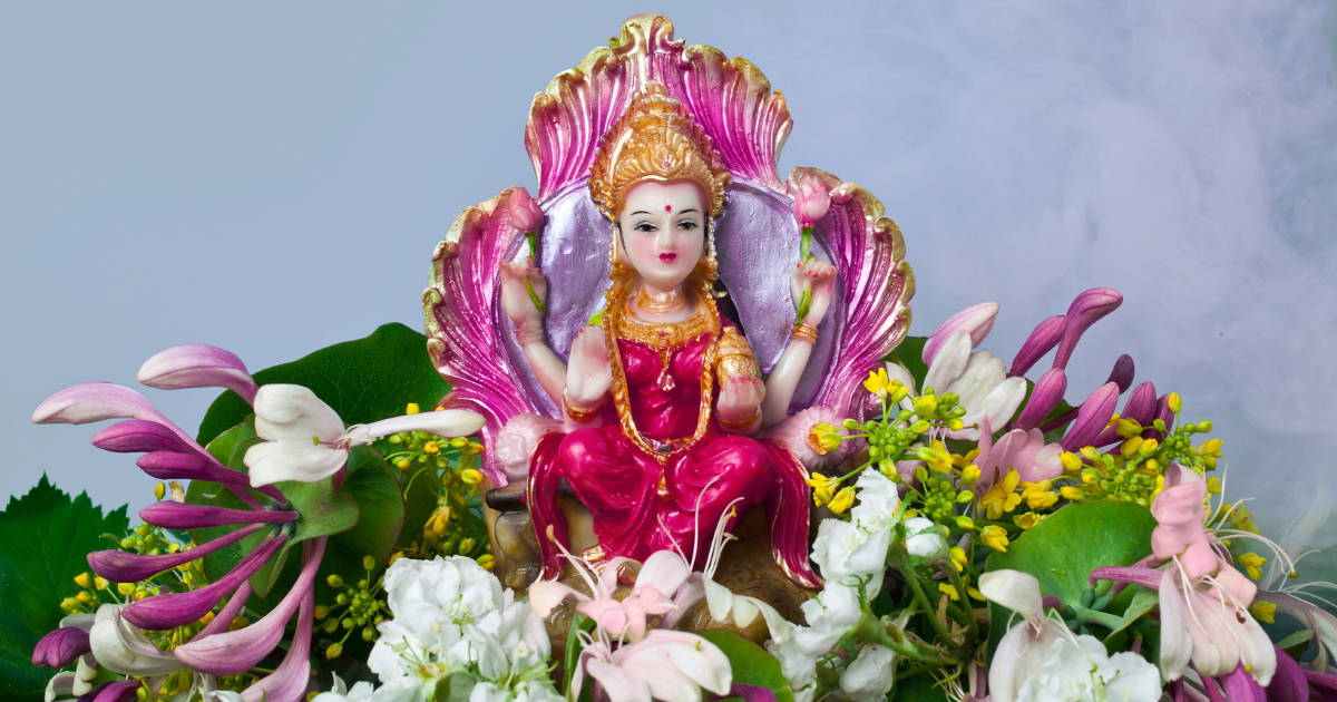 Goddess Lakshmi statue with flowers Shreem Brzee Manifest